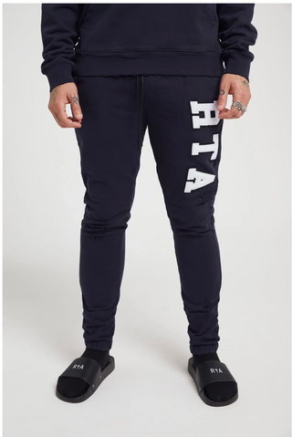 RTA OWEN SWEATPANT | NAVY COLLEGIATE | ME00K83
