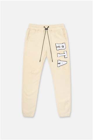 RTA OWEN SWEATPANT | BEIGE COLLEGIATE| ME00K83